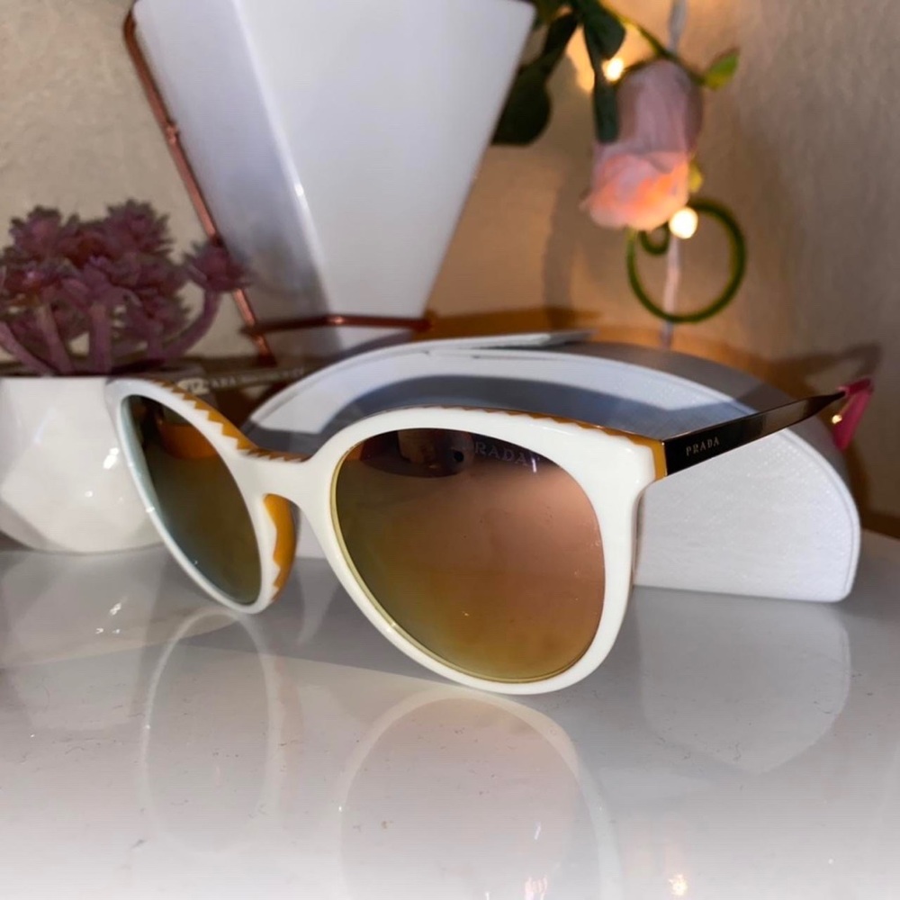 like this edinafitz retro prada sunglasses white/pink/orange